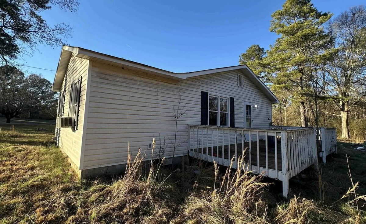 Older house with deferred maintenance bought as-is in Harrison, next door to Ooltewah in Hamilton County